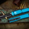 Microtech Ultratech Turquoise OTF Automatic 3.4" Drop Point Black Serrated 121-2TQ