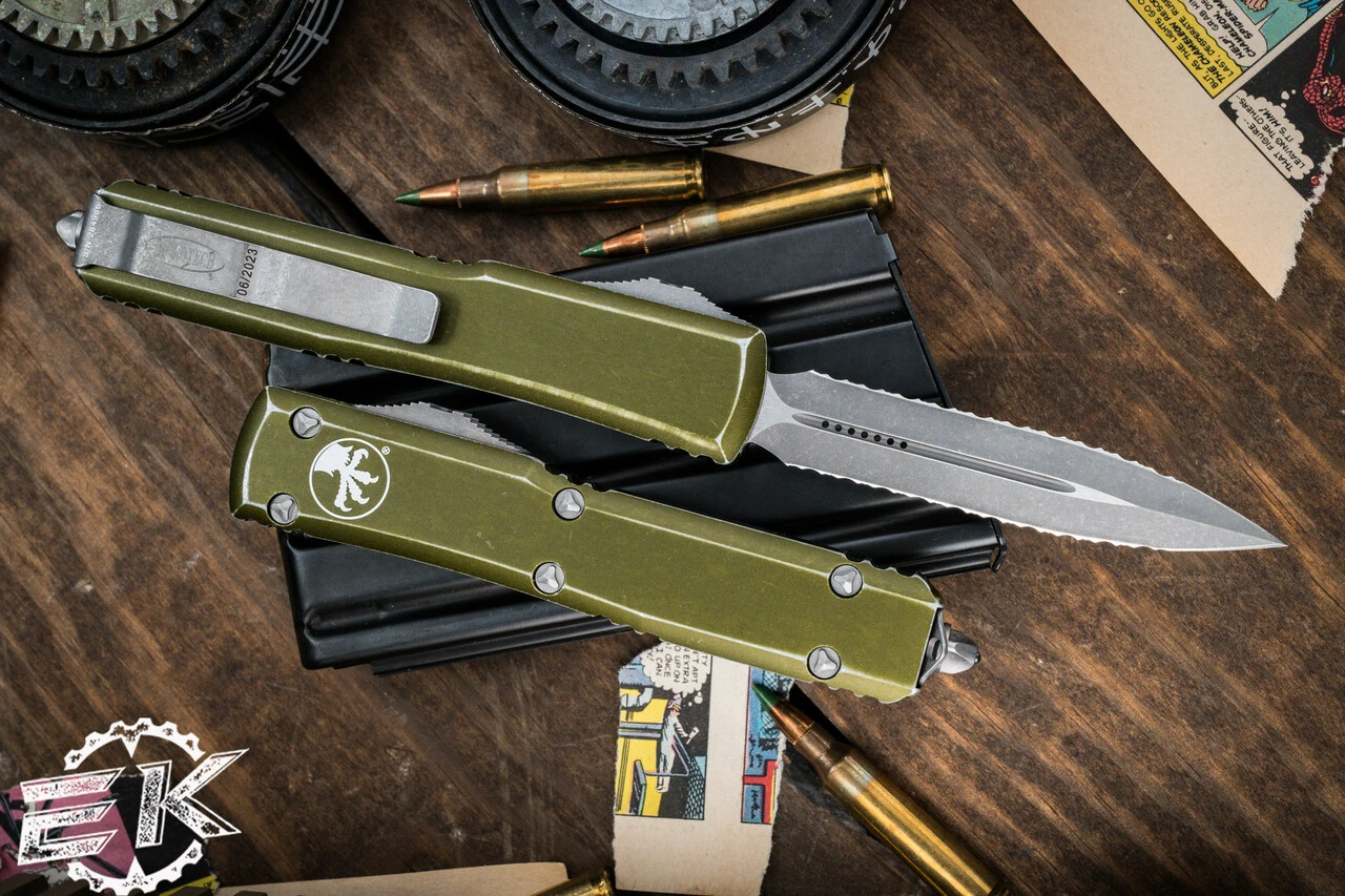 Microtech Ultratech OTF Auto Knife Distressed OD Green 3.4" Dagger Double Full Serrated 122-D12DOD 4 Microtech Ultratech OTF Auto Knife Distressed OD Green 3.4" Dagger Double Full Serrated 122-D12DOD - Image 2