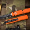 Microtech Ultratech OTF Automatic Knife Orange 3.4" Tanto Serrated Black 123-2OR