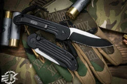 Microtech LUDT Automatic Folding Knife 3.4" Drop Point Black Serrated 135-2T 5 Microtech LUDT Automatic Folding Knife 3.4" Drop Point Black Serrated 135-2T -Southern Blades 135 2T 35554.1676587825