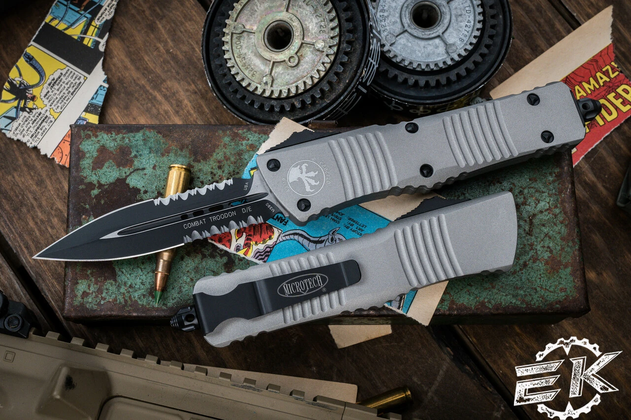 Microtech Combat Troodon OTF Automatic Knife Gray Aluminum 3.8" Dagger Black Serrated 142-2TG 3 Microtech Combat Troodon OTF Automatic Knife Gray Aluminum 3.8" Dagger Black Serrated 142-2TG