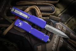 Microtech UTX-70 OTF Automatic Knife Purple 2.4" Dagger Stonewash 147-10PU 6 Microtech UTX-70 OTF Automatic Knife Purple 2.4" Dagger Stonewash 147-10PU -Southern Blades 147 10 PU 2 72444.1663875932