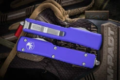 Microtech UTX-70 OTF Automatic Knife Purple 2.4" Dagger Stonewash 147-10PU 7 Microtech UTX-70 OTF Automatic Knife Purple 2.4" Dagger Stonewash 147-10PU -Southern Blades 147 10 PU Closed 67046.1663875933