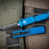 Microtech UTX-70 OTF Automatic Knife Blue 2.4" Dagger Black Serrated 147-3BL 2 Microtech UTX-70 OTF Automatic Knife Blue 2.4" Dagger Black Serrated 147-3BL -Southern Blades 147 3 BL 2 96116.1678167461