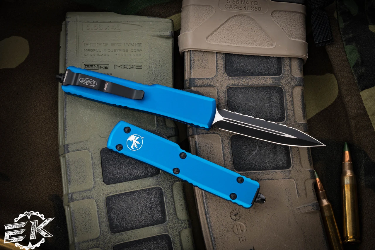 Microtech UTX-70 OTF Automatic Knife Blue 2.4" Dagger Black Serrated 147-3BL 4 Microtech UTX-70 OTF Automatic Knife Blue 2.4" Dagger Black Serrated 147-3BL - Image 2
