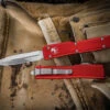 Microtech UTX-70 OTF Automatic Knife Red 2.4" Dagger Satin 147-4RD 1 Microtech UTX-70 OTF Automatic Knife Red 2.4" Dagger Satin 147-4RD -Southern Blades 147 4 RD 80446.1663883590