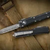 Microtech UTX-70 OTF Automatic Knife Distressed Black 2.4" Dagger Double Full Serrated Stonewash 147-D12DBK 1 Microtech UTX-70 OTF Automatic Knife Distressed Black 2.4" Dagger Double Full Serrated Stonewash 147-D12DBK -Southern Blades 147 D12 DBK 2 71530.1678166495