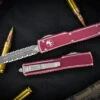Microtech UTX-70 Distressed Merlot Red OTF Knife 2.4" Dagger Double Serrated Stonewash 147-D12DMR 1 Microtech UTX-70 Distressed Merlot Red OTF Knife 2.4" Dagger Double Serrated Stonewash 147-D12DMR -Southern Blades 147 D12 DMR 2 01455.1677353194