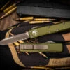 Microtech UTX-85 OTF Automatic Knife OD Green 3.1" Drop Point Bronze Apocalyptic Serrated 231-14APOD 1 Microtech UTX-85 OTF Automatic Knife OD Green 3.1" Drop Point Bronze Apocalyptic Serrated 231-14APOD -Southern Blades 231 14 APOD 2 54592.1679520114