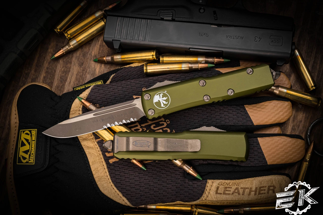 Microtech UTX-85 OTF Automatic Knife OD Green 3.1" Drop Point Bronze Apocalyptic Serrated 231-14APOD 3 Microtech UTX-85 OTF Automatic Knife OD Green 3.1" Drop Point Bronze Apocalyptic Serrated 231-14APOD