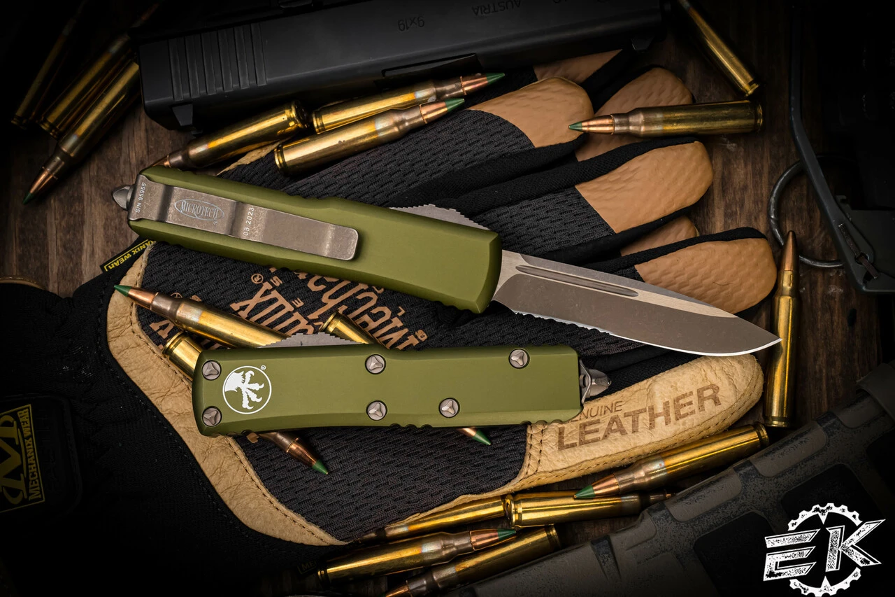 Microtech UTX-85 OTF Automatic Knife OD Green 3.1" Drop Point Bronze Apocalyptic Serrated 231-14APOD 4 Microtech UTX-85 OTF Automatic Knife OD Green 3.1" Drop Point Bronze Apocalyptic Serrated 231-14APOD - Image 2