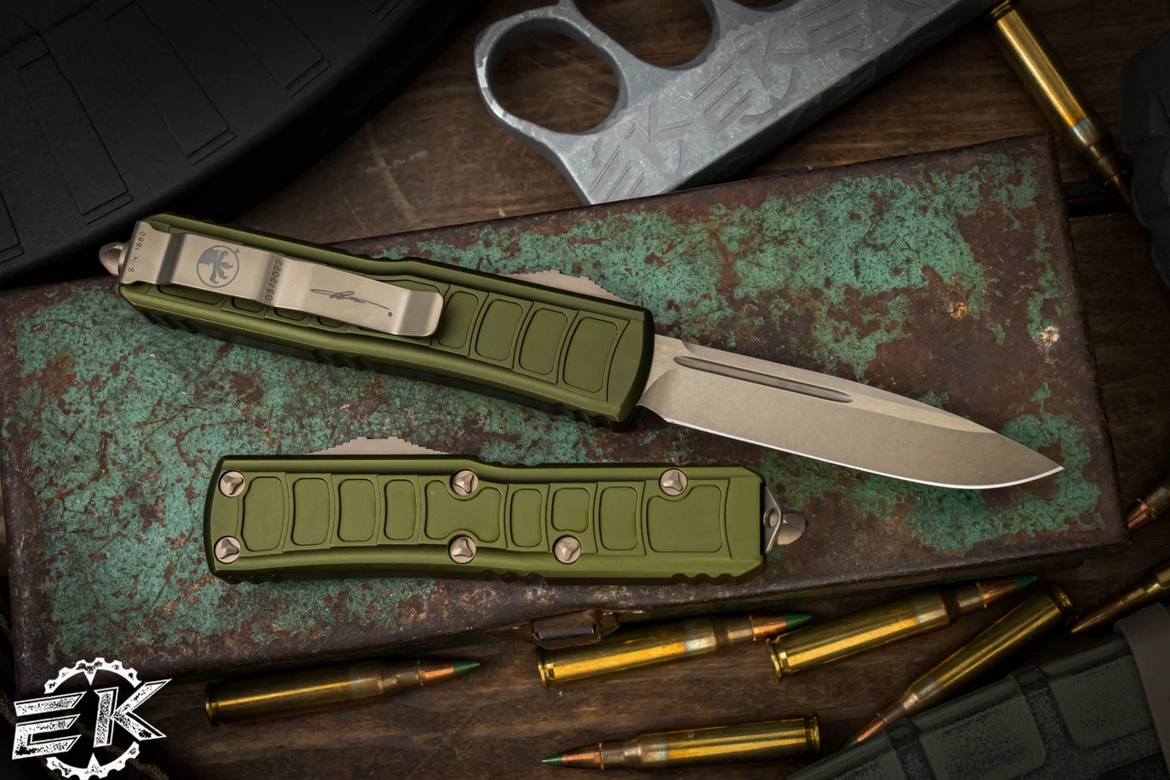Microtech UTX-85 II Stepside OTF Automatic Knife OD Green 3.1" Drop Point Bronze 231II-13ODS 4 Microtech UTX-85 II Stepside OTF Automatic Knife OD Green 3.1" Drop Point Bronze 231II-13ODS - Image 2