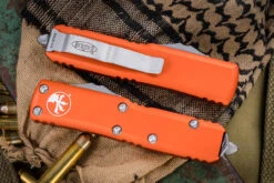 Microtech UTX-85 OTF Automatic Knife Orange 3.1" Dagger Apocalyptic Stonewash 232-10APOR 7 Microtech UTX-85 OTF Automatic Knife Orange 3.1" Dagger Apocalyptic Stonewash 232-10APOR -Southern Blades 232 10 APOR Closed 49257.1664572025