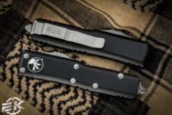 Microtech UTX-85 Black OTF Apocalyptic Stonewash Serrated 232-11AP 7 Microtech UTX-85 Black OTF Apocalyptic Stonewash Serrated 232-11AP -Southern Blades 232 11 AP 3 97681.1677363124