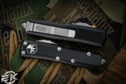 Microtech UTX-85 OTF Automatic Knife Black 3.1" Dagger Stonewash Serrated 232-12 7 Microtech UTX-85 OTF Automatic Knife Black 3.1" Dagger Stonewash Serrated 232-12 -Southern Blades 232 12 3 10329.1677363716