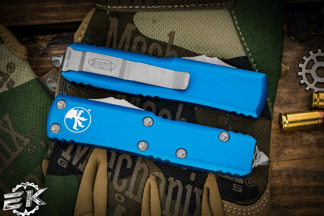Microtech UTX-85 Blue OTF 3" Dagger Stonewash Apocalyptic Serrated 232-12APBL 4 Microtech UTX-85 Blue OTF 3" Dagger Stonewash Apocalyptic Serrated 232-12APBL - Image 2