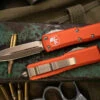 Microtech UTX-85 OTF Automatic Knife Orange 3.1" Dagger Bronze 232-13OR 1 Microtech UTX-85 OTF Automatic Knife Orange 3.1" Dagger Bronze 232-13OR -Southern Blades 232 13 OR 47193.1684274623