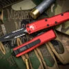 Microtech UTX-85 OTF Automatic Knife Red 3.1" Dagger Serrated Black 232-2RD 1 Microtech UTX-85 OTF Automatic Knife Red 3.1" Dagger Serrated Black 232-2RD -Southern Blades 232 2 RD 5 66120.1676588970