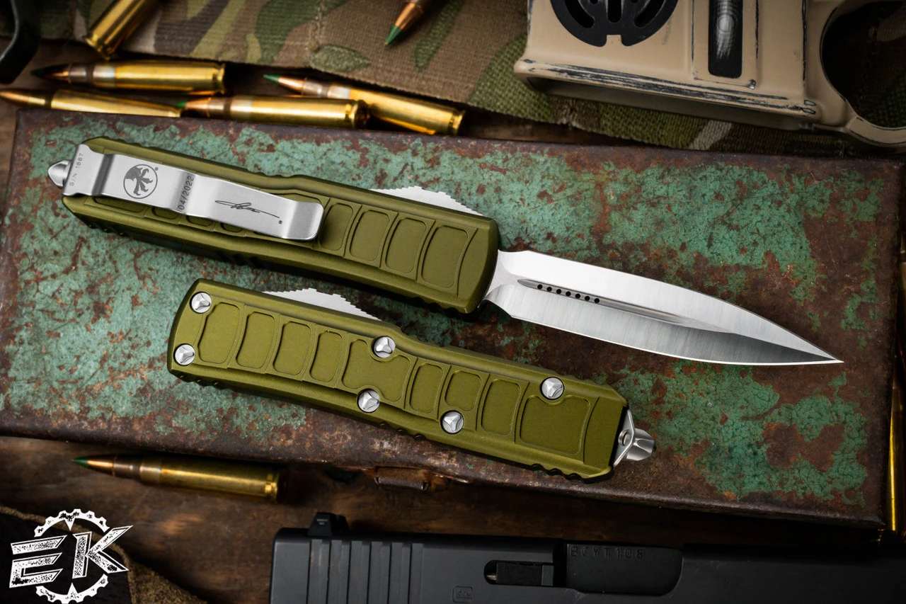 Microtech UTX-85 II Stepside OD Green OTF Automatic Knife 3" Dagger Satin 232II-4ODS 4 Microtech UTX-85 II Stepside OD Green OTF Automatic Knife 3" Dagger Satin 232II-4ODS - Image 2