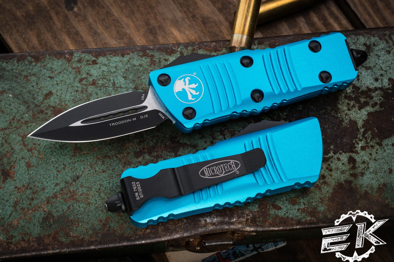 Microtech Troodon Mini OTF Automatic Knife Turquoise 1.9" Dagger Black 238-1TQ 3 Microtech Troodon Mini OTF Automatic Knife Turquoise 1.9" Dagger Black 238-1TQ