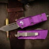 Microtech Troodon Mini OTF Automatic Knife Violet 1.9" Tanto Bronze 240-13VI 1 Microtech Troodon Mini OTF Automatic Knife Violet 1.9" Tanto Bronze 240-13VI -Southern Blades 240 13 VI 2 57788.1675024929