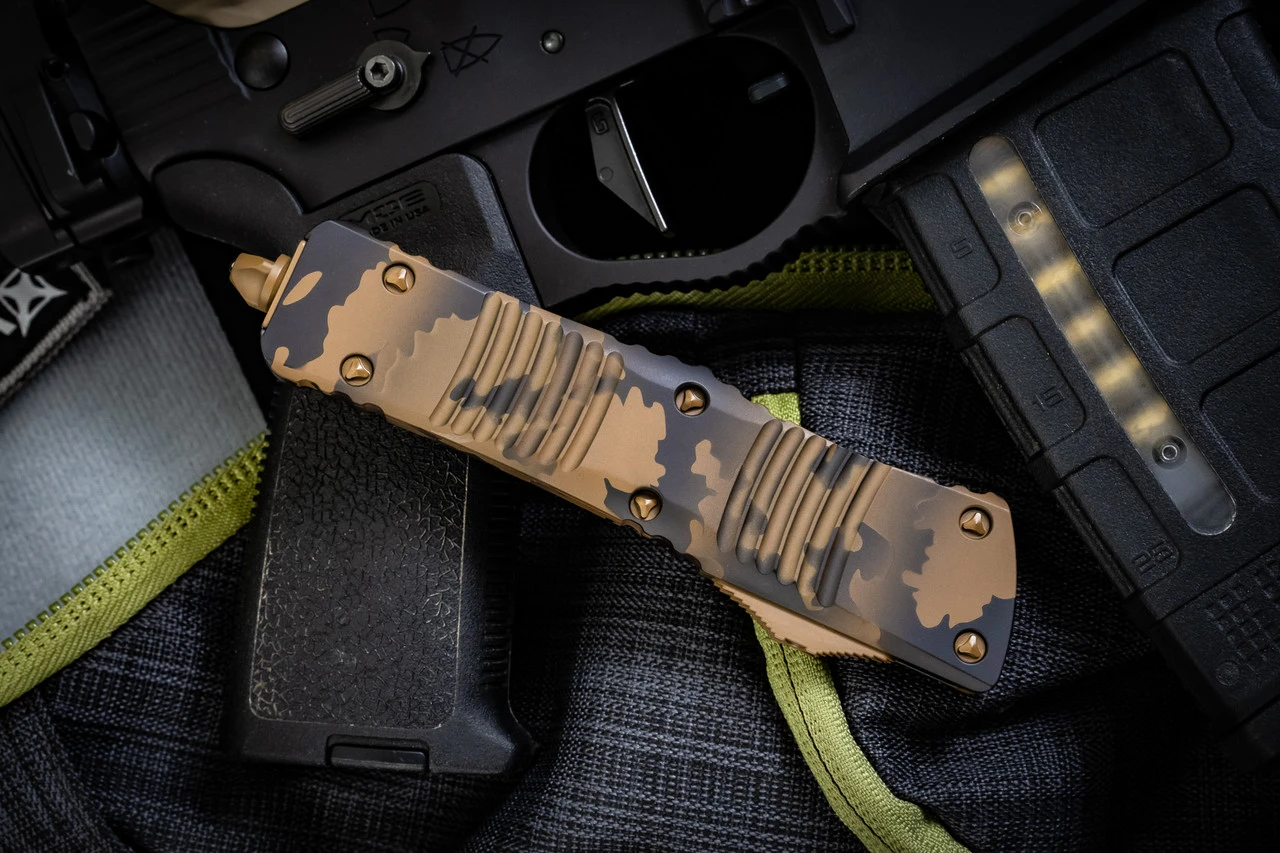 Microtech Combat Troodon Coyote Tan Camo Cerakote OTF Automatic Knife 3.8" Tan Camo Dagger Serrated 142-3CCS 4 Microtech Combat Troodon Coyote Tan Camo Cerakote OTF Automatic Knife 3.8" Tan Camo Dagger Serrated 142-3CCS - Image 2
