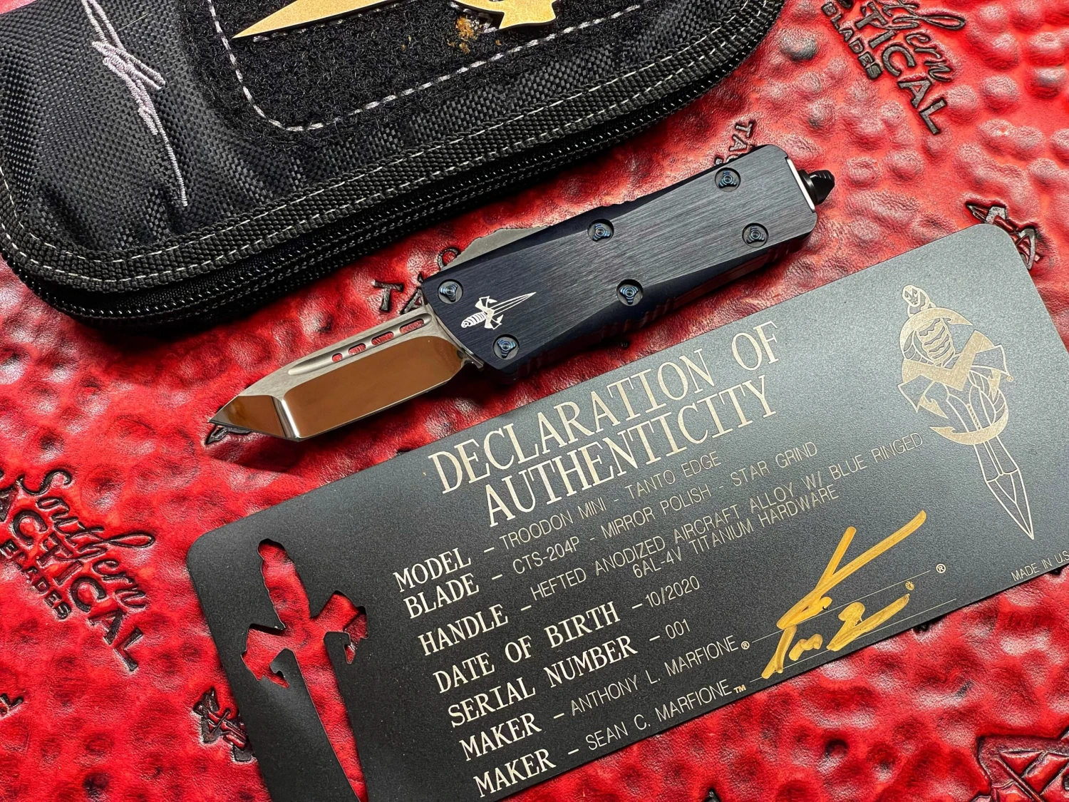 Marfione Custom Knives Mini Troodon Tanto Mirror Polished Star Grind, Hefted Alloy, Blue Ringed Titanium Accents 4 Marfione Custom Knives Mini Troodon Tanto Mirror Polished Star Grind, Hefted Alloy, Blue Ringed Titanium Accents - Image 2