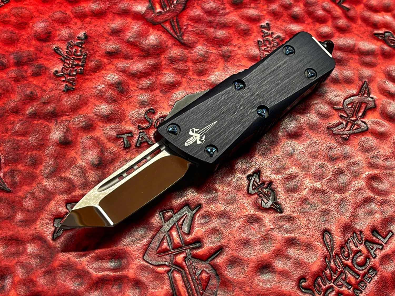 Marfione Custom Knives Mini Troodon Tanto Mirror Polished Star Grind, Hefted Alloy, Blue Ringed Titanium Accents 3 Marfione Custom Knives Mini Troodon Tanto Mirror Polished Star Grind, Hefted Alloy, Blue Ringed Titanium Accents