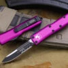 Microtech UTX-85 OTF Automatic Knife Violet 3" Drop Point Black Serrated 231-2VI 2 Microtech UTX-85 OTF Automatic Knife Violet 3" Drop Point Black Serrated 231-2VI -Southern Blades IMG 7517 95185.1678806831