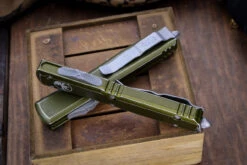 Microtech Ultratech OTF Automatic Knife Distressed OD Green 3.4" Dagger Stonewash Serrated 122-12DOD 5 Microtech Ultratech OTF Automatic Knife Distressed OD Green 3.4" Dagger Stonewash Serrated 122-12DOD -Southern Blades IMG 8474 16955.1690508301