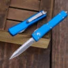 Microtech UTX-70 OTF Automatic Knife Blue 2.4" Dagger Serrated Stonewash 147-12BL 1 Microtech UTX-70 OTF Automatic Knife Blue 2.4" Dagger Serrated Stonewash 147-12BL -Southern Blades IMG 8562 2 87638.1690555494