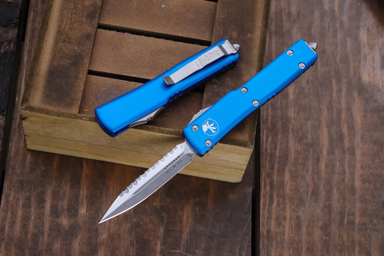 Microtech UTX-70 OTF Automatic Knife Blue 2.4" Dagger Serrated Stonewash 147-12BL 3 Microtech UTX-70 OTF Automatic Knife Blue 2.4" Dagger Serrated Stonewash 147-12BL