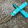 Microtech Ultratech Double Edge Full Serrated Turquoise 1 Microtech Ultratech Double Edge Full Serrated Turquoise -Southern Blades MT122 3TQ 2