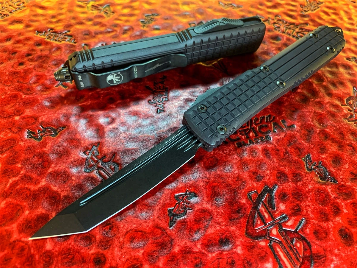 Microtech Ultratech Delta Tanto, DLC Fluted Blade, DLC Parts W/ Nickel Boron Internals. Ported Chassis 3 Microtech Ultratech Delta Tanto, DLC Fluted Blade, DLC Parts W/ Nickel Boron Internals. Ported Chassis