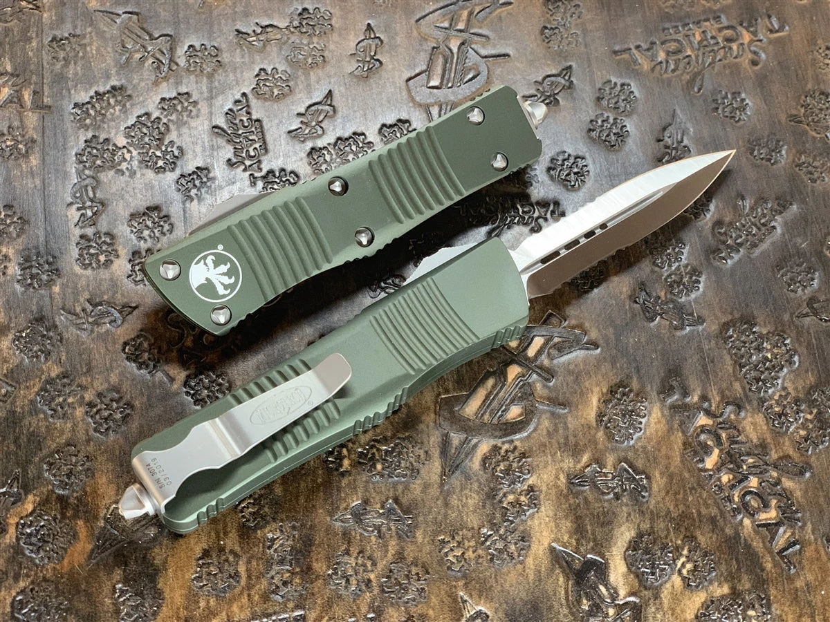 Microtech Troodon Double Edge Satin Part Serrated OD Green 4 Microtech Troodon Double Edge Satin Part Serrated OD Green - Image 2