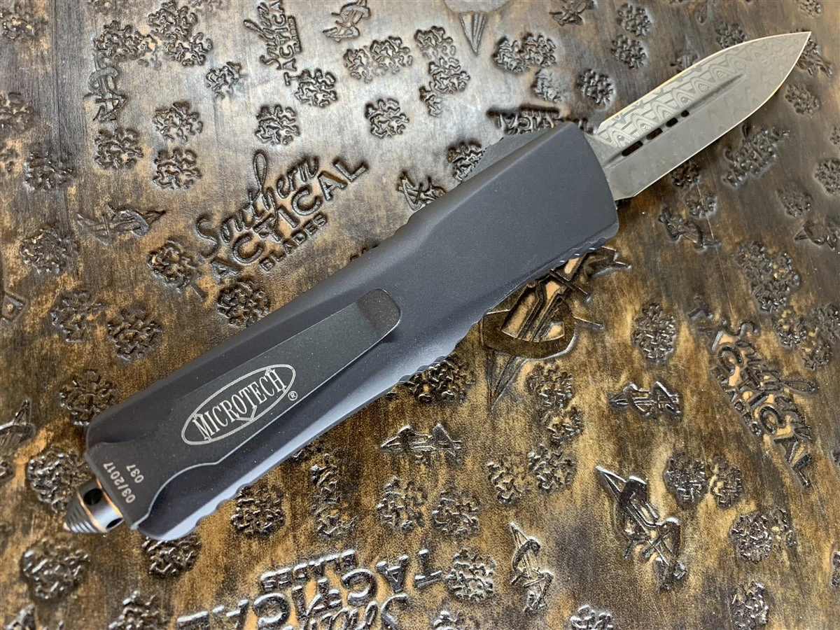 Microtech Combat Troodon Double Edge Damascus Copper Ringed Accents (Pre-Owned) 4 Microtech Combat Troodon Double Edge Damascus Copper Ringed Accents (Pre-Owned) - Image 2