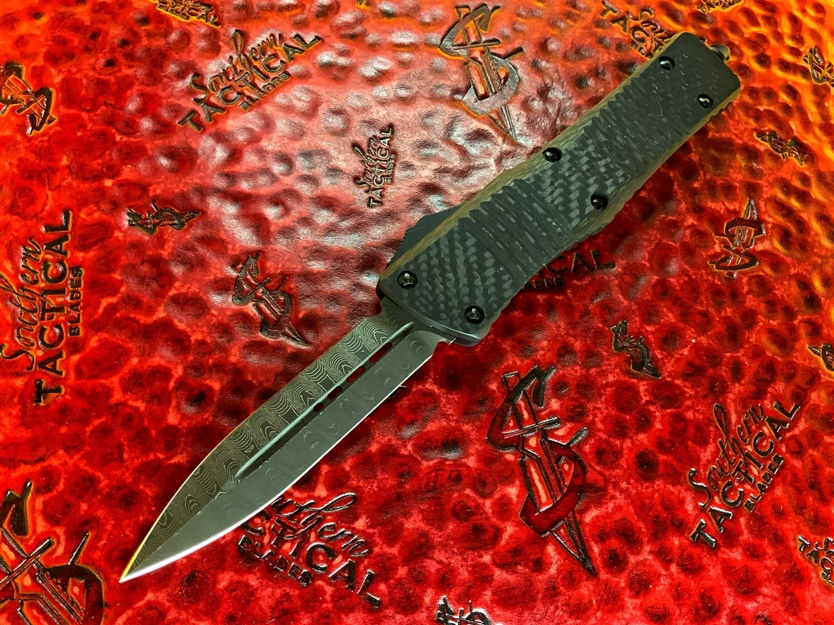 Microtech Signature Series Combat Troodon Double Edge Damascus Carbon Fiber Ringed Titanium 4 Microtech Signature Series Combat Troodon Double Edge Damascus Carbon Fiber Ringed Titanium - Image 2