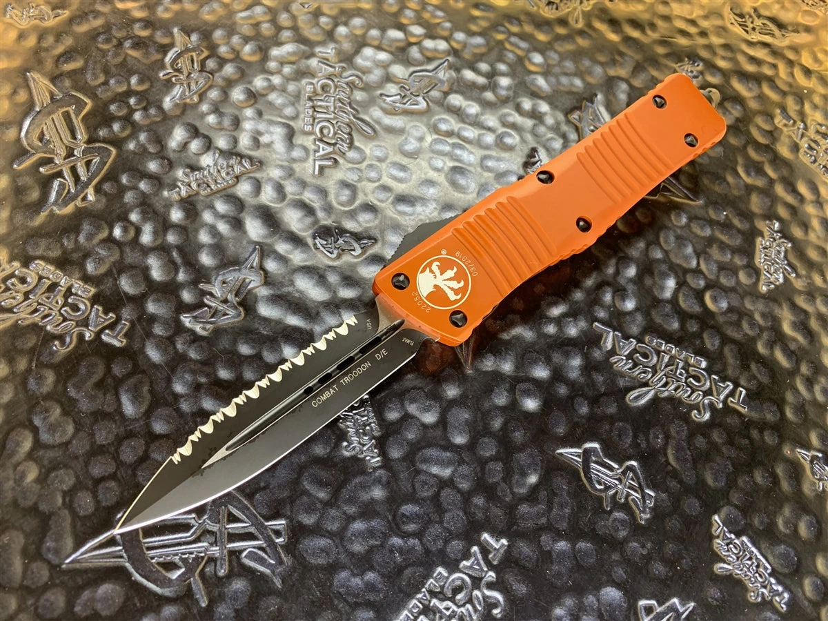 Microtech Combat Troodon Double Edge Full Serrated Orange 3 Microtech Combat Troodon Double Edge Full Serrated Orange