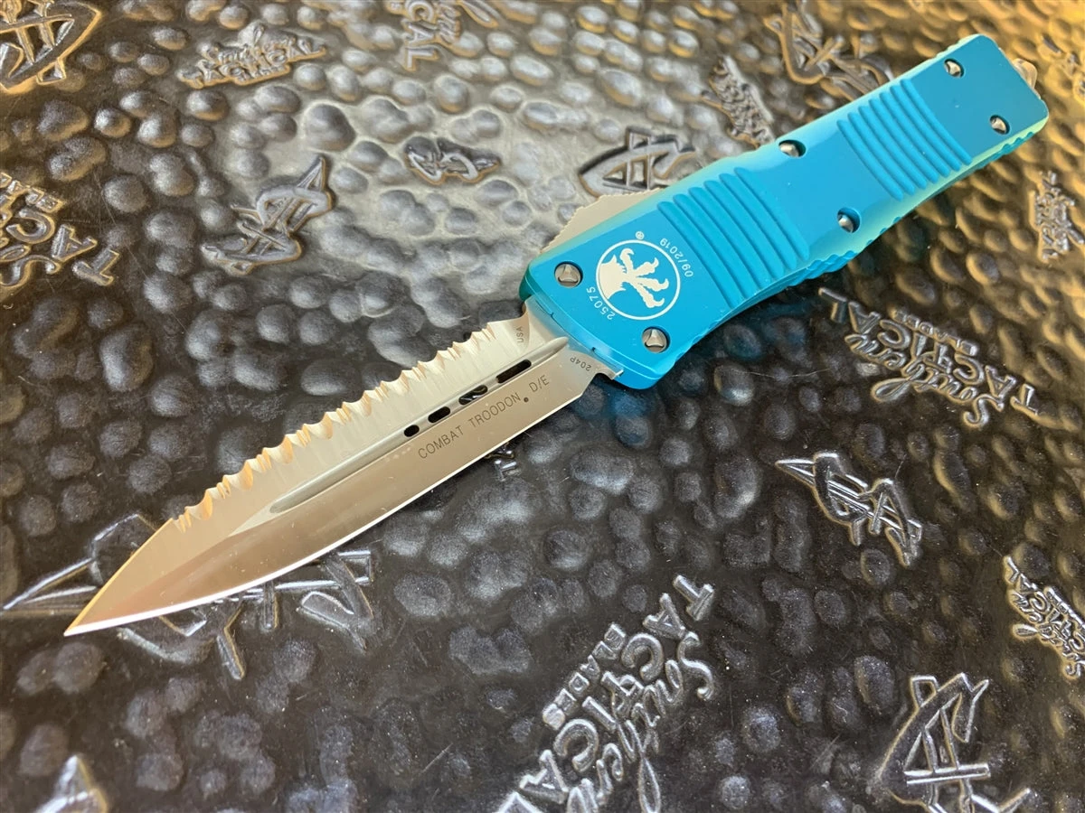 Microtech Combat Troodon Double Edge Satin Full Serrated Turquoise 3 Microtech Combat Troodon Double Edge Satin Full Serrated Turquoise
