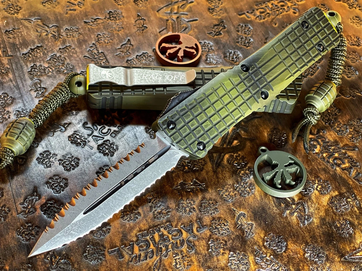 Microtech Combat Troodon Double Reverse Full Serrated Apocalyptic “Frag Off” Grenade Green 4 Microtech Combat Troodon Double Reverse Full Serrated Apocalyptic “Frag Off” Grenade Green - Image 2