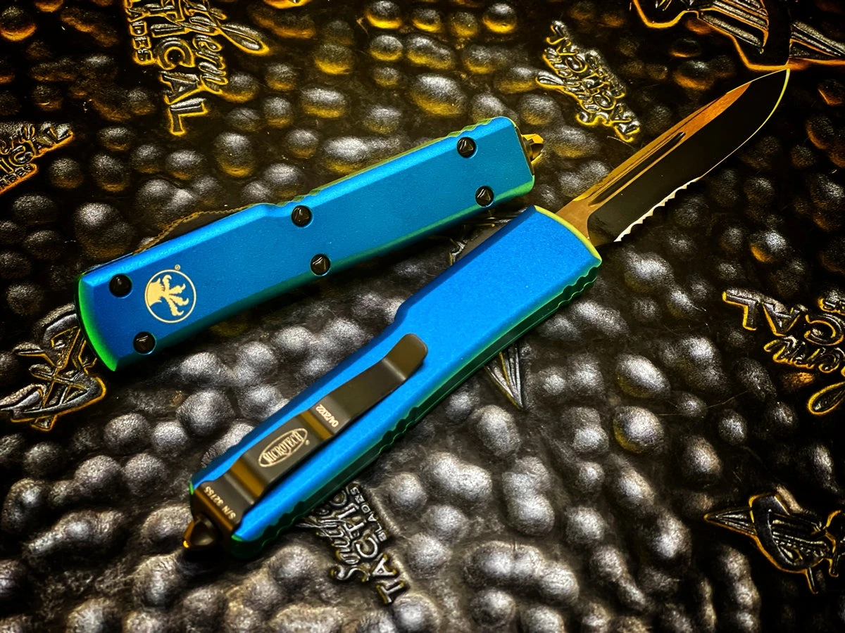 Microtech UTX-70 Single Edge Black Blade Part Serrated Blue 4 Microtech UTX-70 Single Edge Black Blade Part Serrated Blue - Image 2