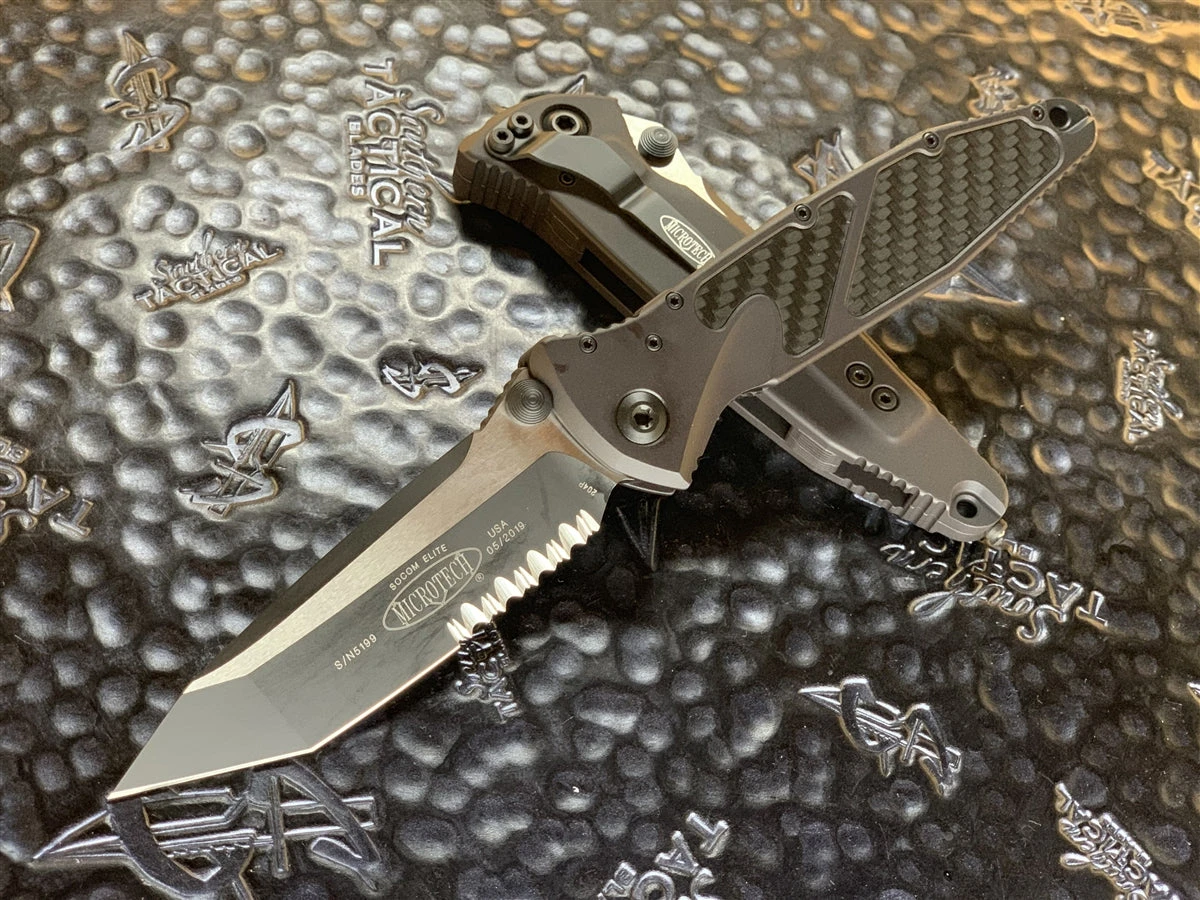 Microtech Socom Elite Manual Tanto Part Serrated Black Carbon Fiber Inlay 2 Microtech Socom Elite Manual Tanto Part Serrated Black Carbon Fiber Inlay