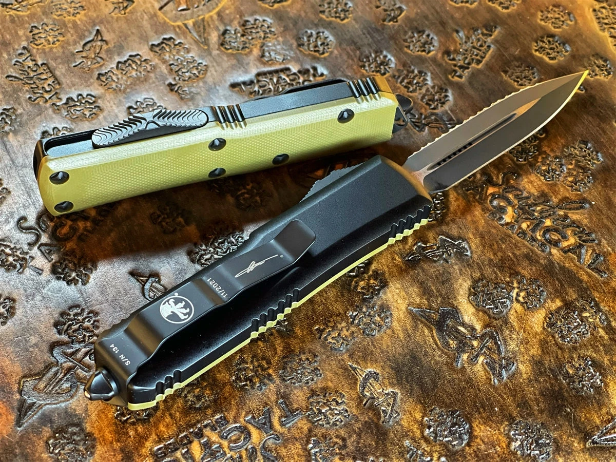 Microtech UTX-85 Double Edge Full Serrated G10 OD Green Top 4 Microtech UTX-85 Double Edge Full Serrated G10 OD Green Top - Image 2