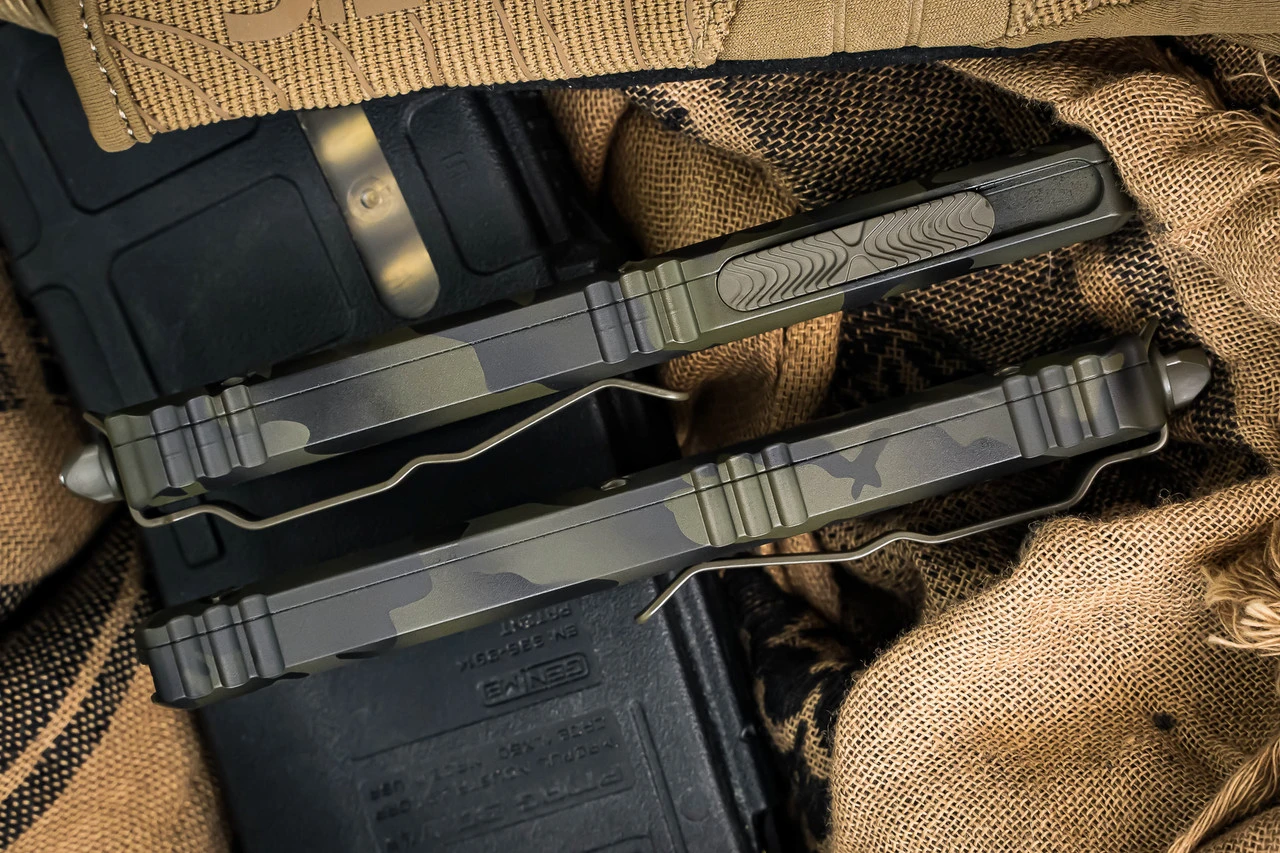 Microtech Ultratech OD Green Camo Cerakote OTF Automatic Knife 3.4" OD Camo Dagger Serrated 122-3OCS 5 Microtech Ultratech OD Green Camo Cerakote OTF Automatic Knife 3.4" OD Camo Dagger Serrated 122-3OCS - Image 3