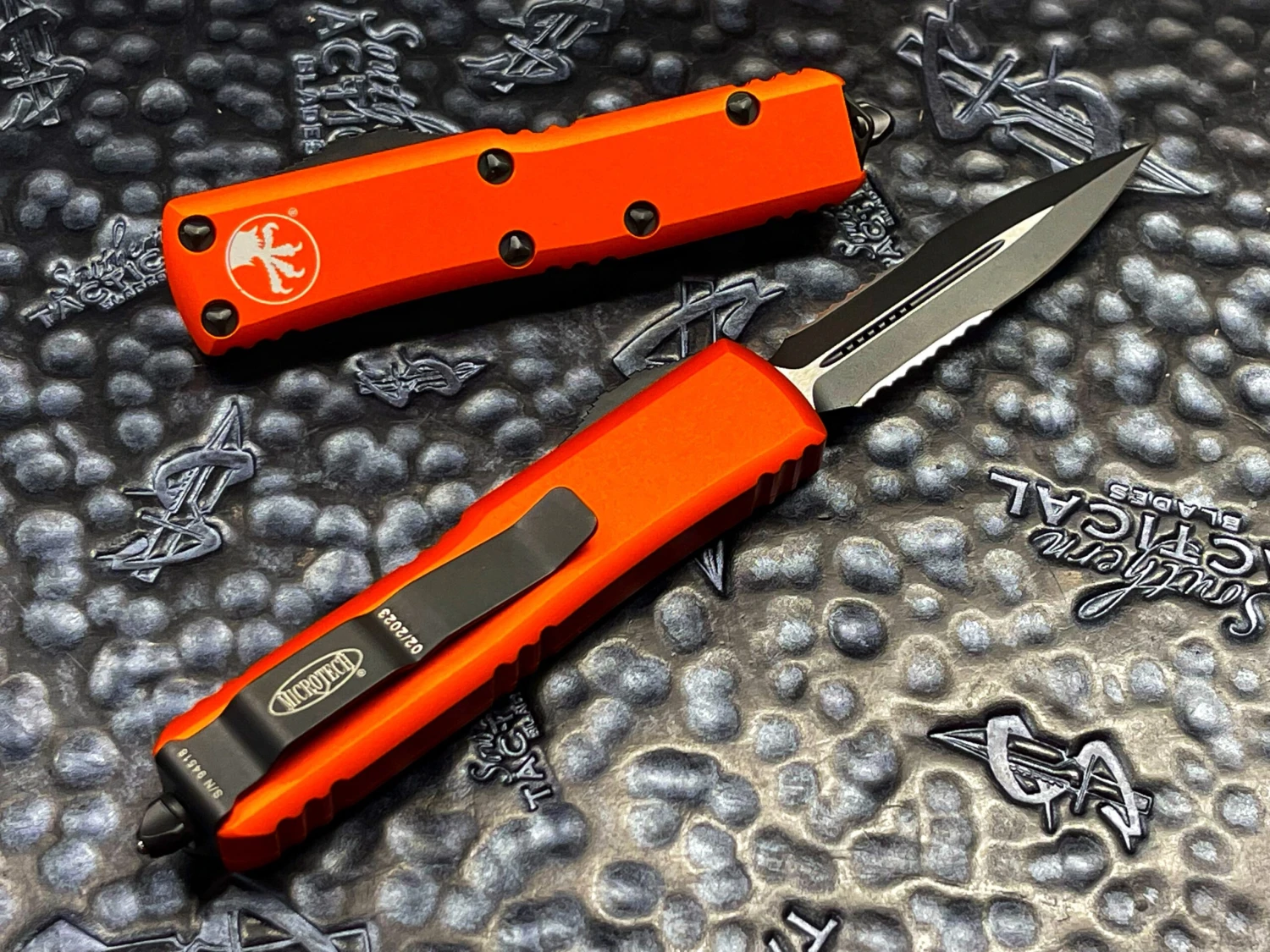 Microtech UTX85 Double Edge Part Serrated Orange 4 Microtech UTX85 Double Edge Part Serrated Orange - Image 2