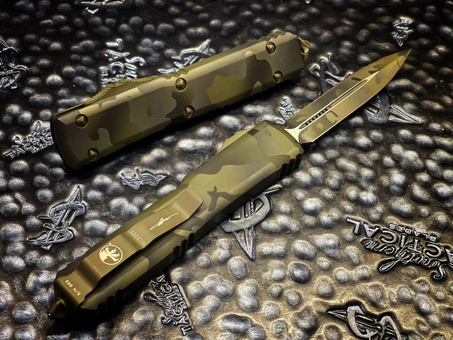 Microtech Ultratech D/E Full Serrated Olive Camo Standard OTF Knife 4 Microtech Ultratech D/E Full Serrated Olive Camo Standard OTF Knife - Image 2