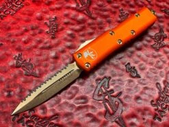 Microtech UTX-85 Double Edge Bronze Full Serrated Orange